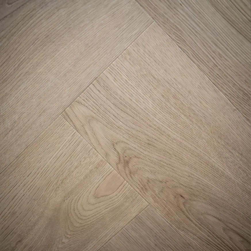Wide herringbone PVC floor in the showroom